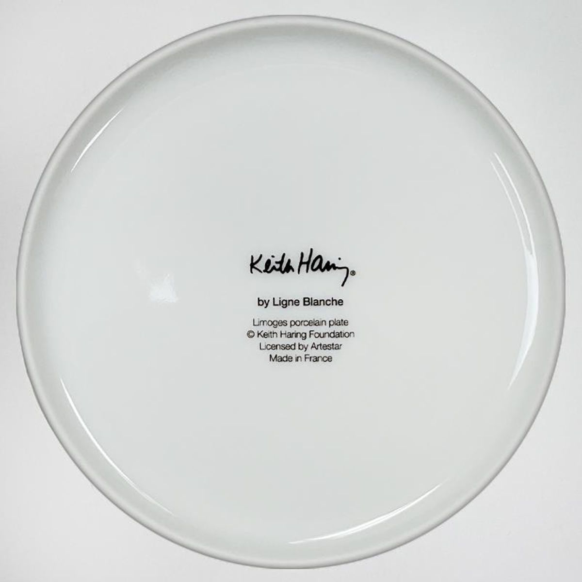 Keith Haring (1958-1990), "White on Red" Framed Limoges Porcelain Plate.